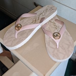 Michael Kors pink logo flip flops